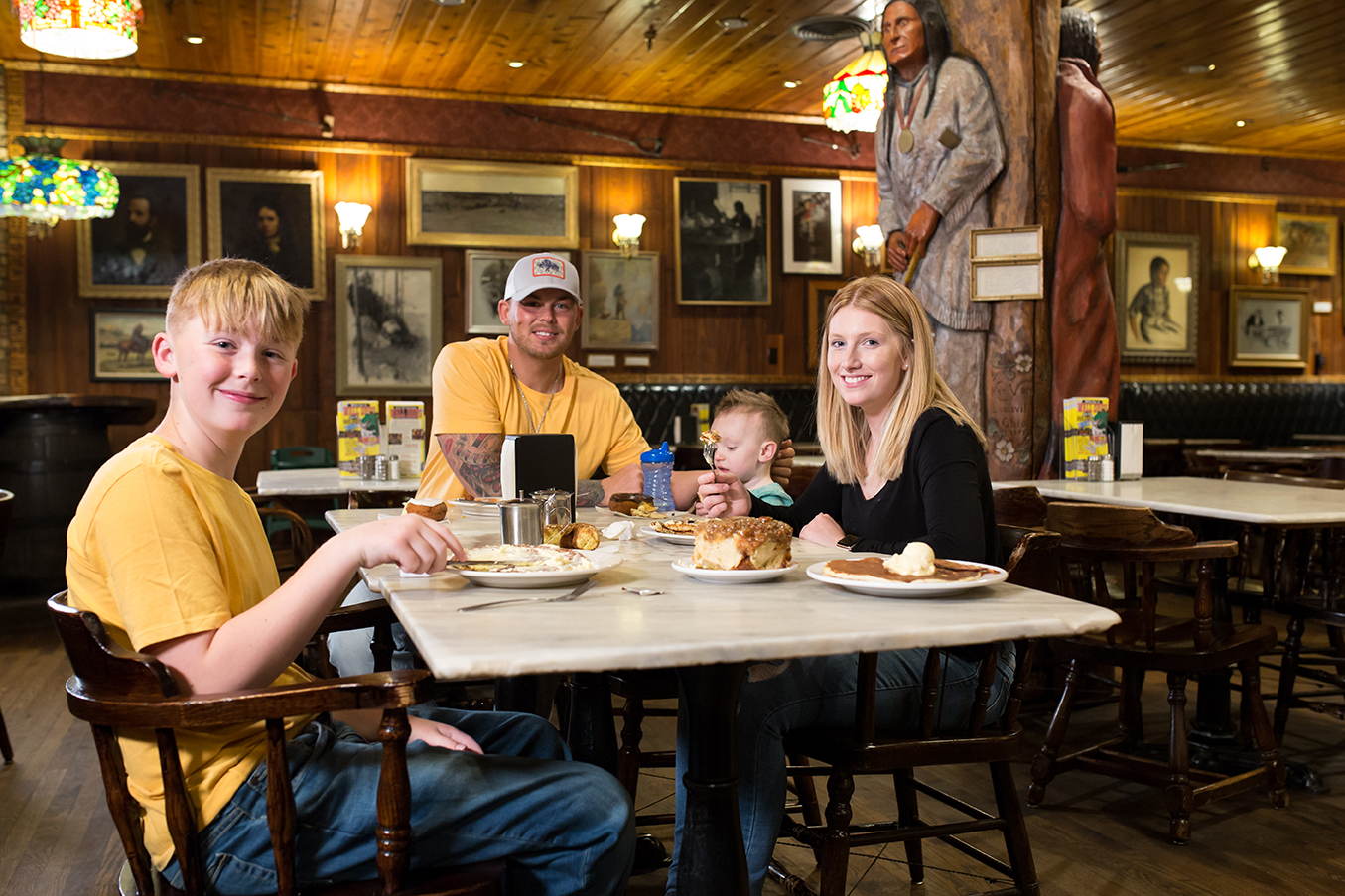 family eating at restaurant